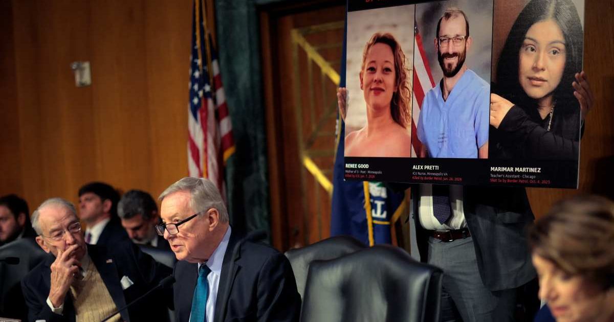 Ranking member Sen. Dick Durbin (D-IL) speaks in front of a poster of Renee Good, Alex Pretti, and Marimar Martinez (Cover Image Source: Getty Images | Photo by Chip Somodevilla)