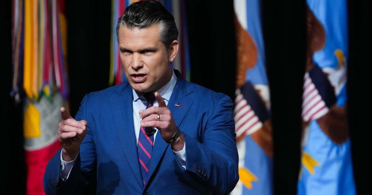 U.S. Secretary of War Pete Hegseth speaks to senior military leaders at Marine Corps Base Quantico on September 30, 2025, in Quantico, Virginia (Cover Image Source: Getty Images | Photo by Andrew Harnik)