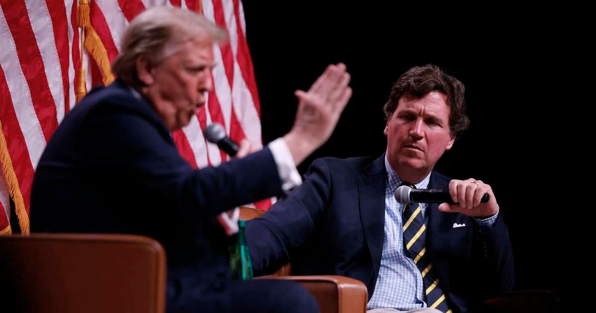 President Donald Trump sits down for a conversation with Tucker Carlson during his Live Tour at the Desert Diamond Arena on October 31, 2024, in Phoenix, Arizona (Cover Image Source: Getty Images | Photo by Chip Somodevilla)