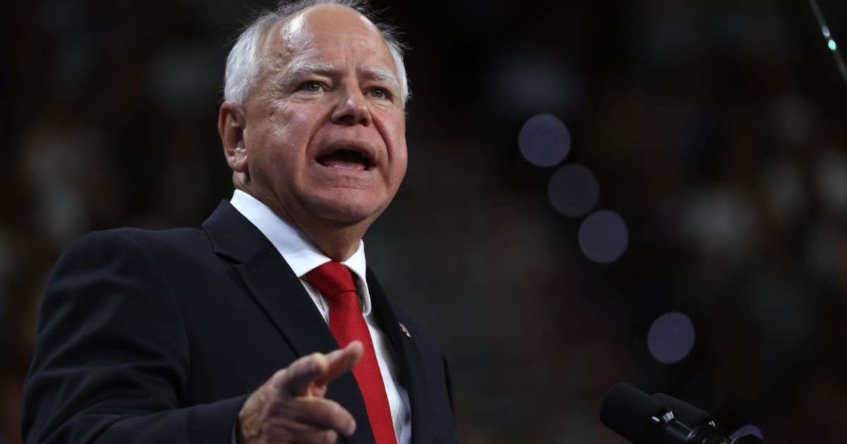Democratic vice presidential candidate (at the time) Minnesota Governor Tim Walz speaks during a campaign rally on August 10, 2024 (Cover image source: Getty Images/Photo by Justin Sullivan)