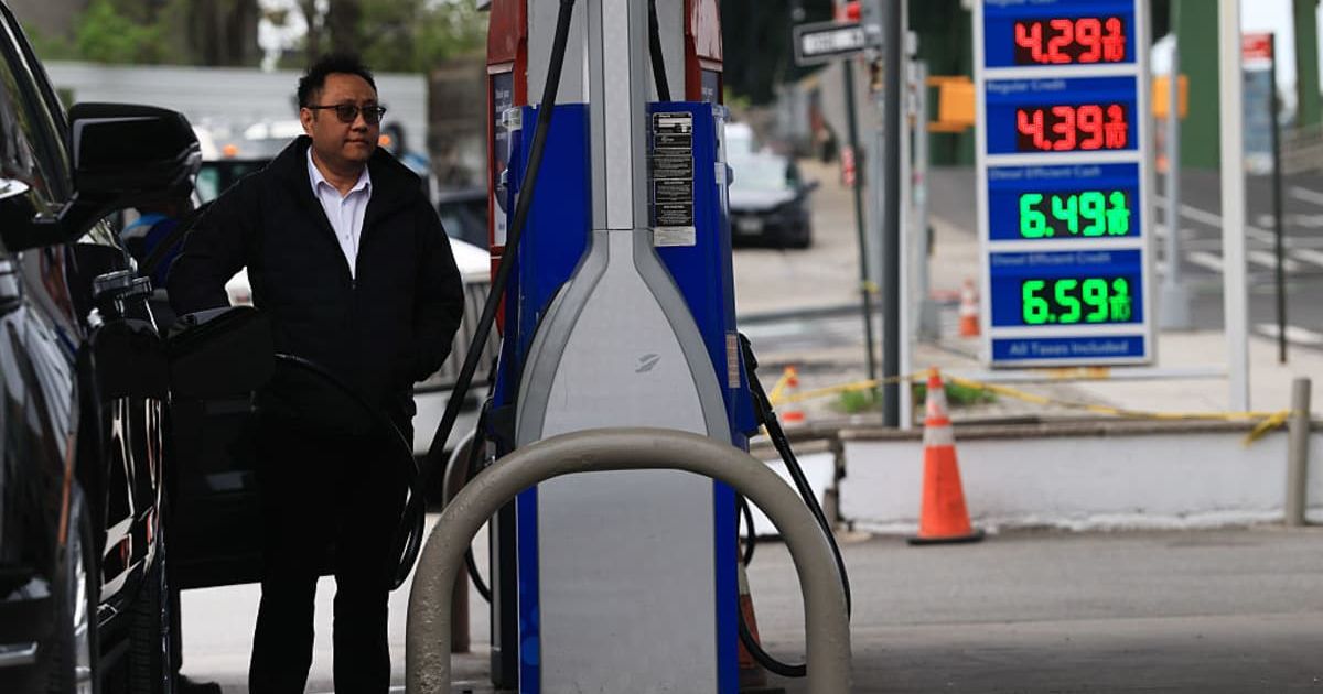 Fuel prices are displayed at a Brooklyn gas station in New York City (Cover Image Source: Getty Images | Photo by  Spencer Platt)
