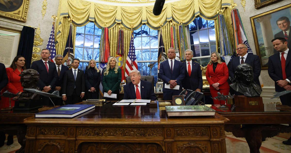 President Donald Trump speaks in the Oval Office with U.S. Secretary of Health and Human Services Robert F. Kennedy Jr. (5R), and other officials on January 29 (Cover Image Source: Getty Images | Photo by Samuel Corum)