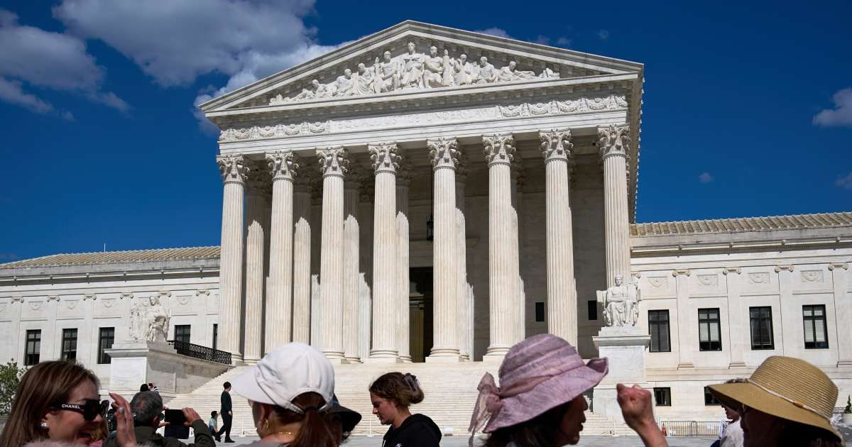 Visitors at the Supreme Court of the United States of America. (Cover Image Source: Photo by Jacquelyn Martin | AP)