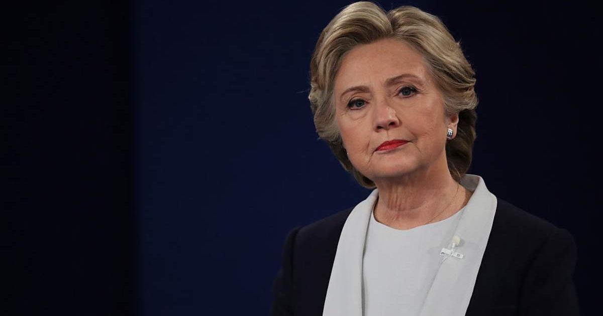 Hillary Clinton listens to a question during the town hall debate at Washington University on October 9, 2016 (Cover Image Source: Getty Images | Photo by Chip Somodevilla)