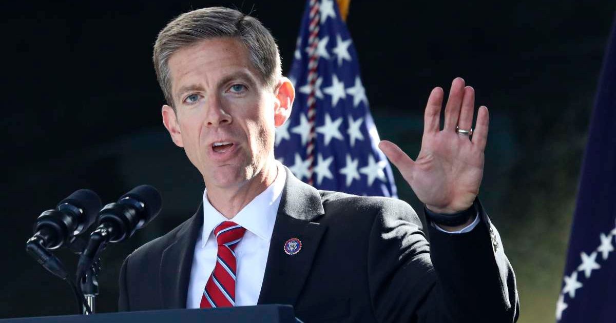 Mike Levin (D-CA) speaks with dignitaries and employees at ViaSat on November 4, 2022, in Carlsbad, California (Cover Image Source: Getty Images | Photo by Sandy Huffaker)