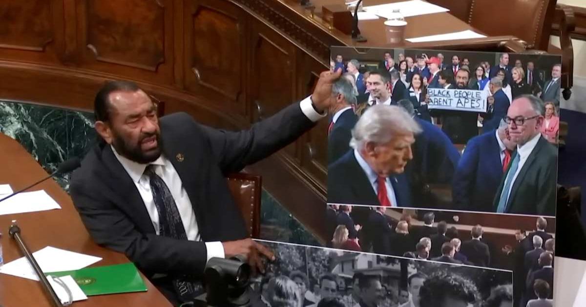 Rep. Al Green holds up a picture as he delivers his remarks during a congressional hearing on June 3 (Cover Image Source: YouTube | @RepAlGreen) 