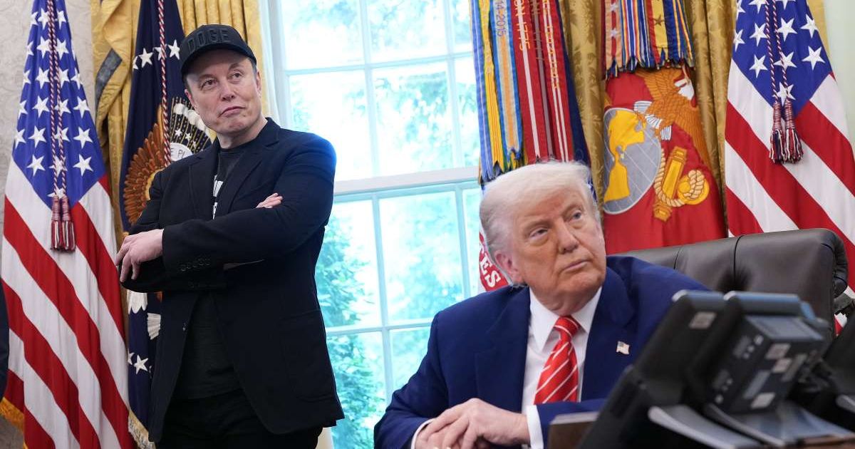 Tesla CEO Elon Musk and U.S. President Donald Trump listen to a question from reporters in the Oval Office of the White House in Washington, DC. (Cover Image Source: Getty Images | Photo by Kevin Dietsch)