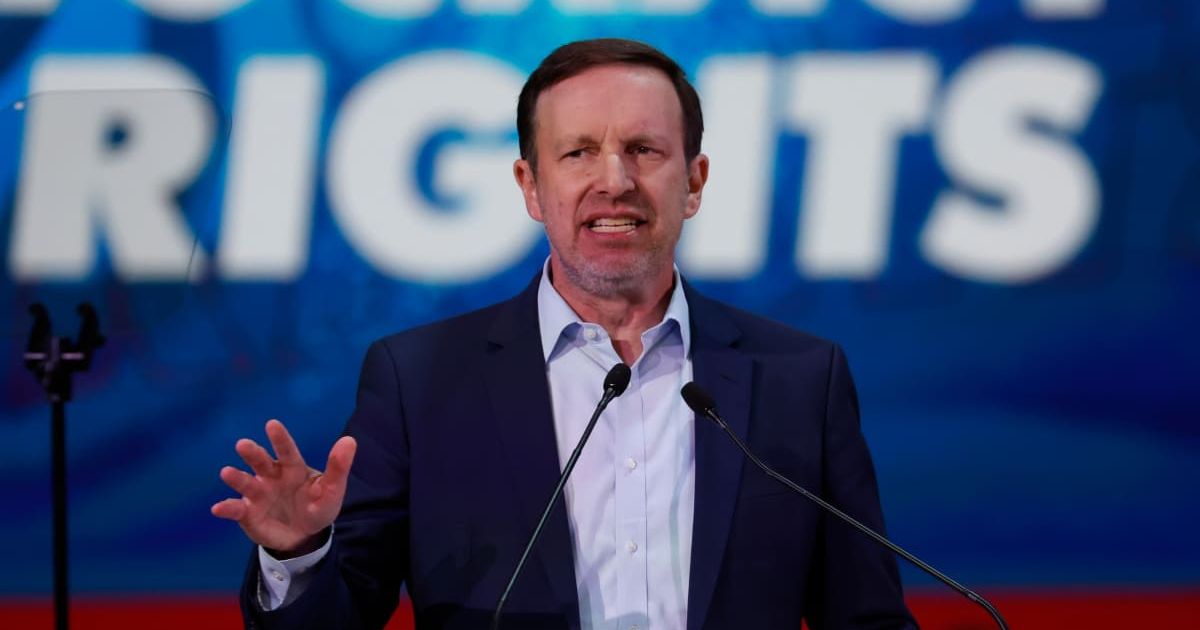 U.S. Sen. Chris Murphy, D-Conn., delivers a speech at the Global Progressive Mobilisation summit in Barcelona, Spain (Cover Image source: AP/ Photo by Joan Monfort)