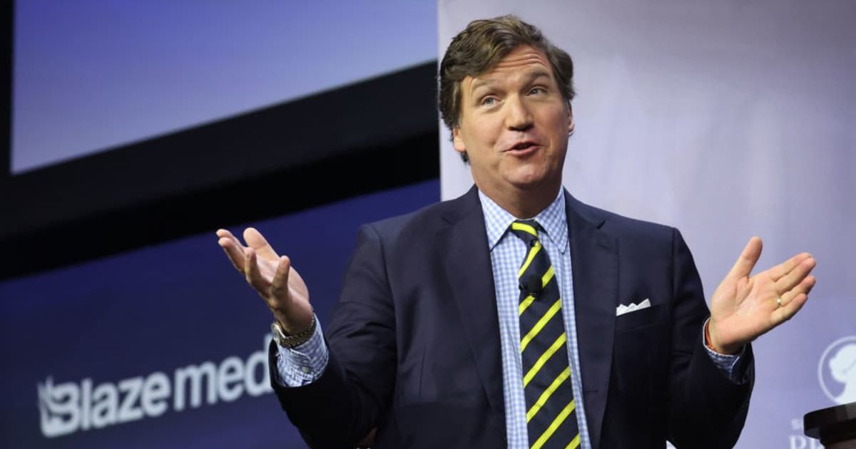 Former Fox News television personality Tucker Carlson speaks to guests at the Family Leadership Summit (Cover Image source: Getty Images/Photo by Scott Olson)