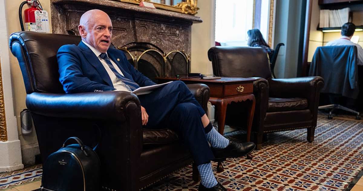 Sen. Mark Kelly (D-AZ) speaks during a pen and pad briefing with reporters at the U.S. Capitol on June 2, 2026 (Cover Image Source: Getty Images | Photo by Eric Lee)
