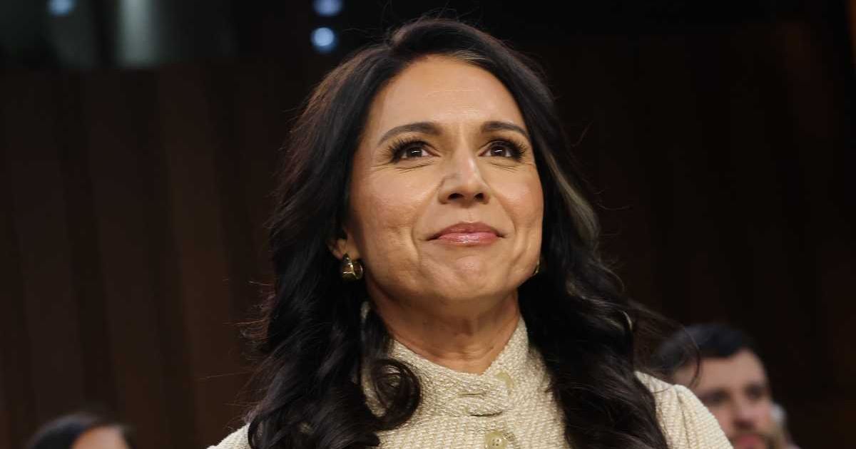 Tulsi Gabbard prepares to testify during a Senate Intelligence Committee hearing in the Hart Senate Office Building on March 18, 2026. (Image Source: Getty Images | Photo by Kevin Dietsch)