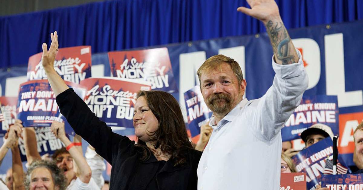 Democratic U.S. Senate candidate Graham Platner and his wife Amy Gertner wave to supporters as they arrive at Platner's Primary Election event on June 9 (Cover Image Source: Getty Images | Photo by CJ Gunther)