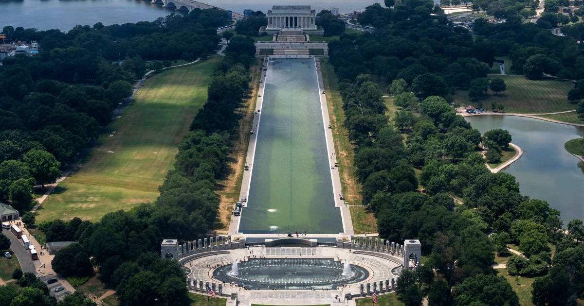 Green algae contaminated the Lincoln Memorial Reflecting Pool as seen from the Washington Memorial on the National Mall, in Washington. (Cover Image Source: AP | Photo by Manuel Balce Ceneta)