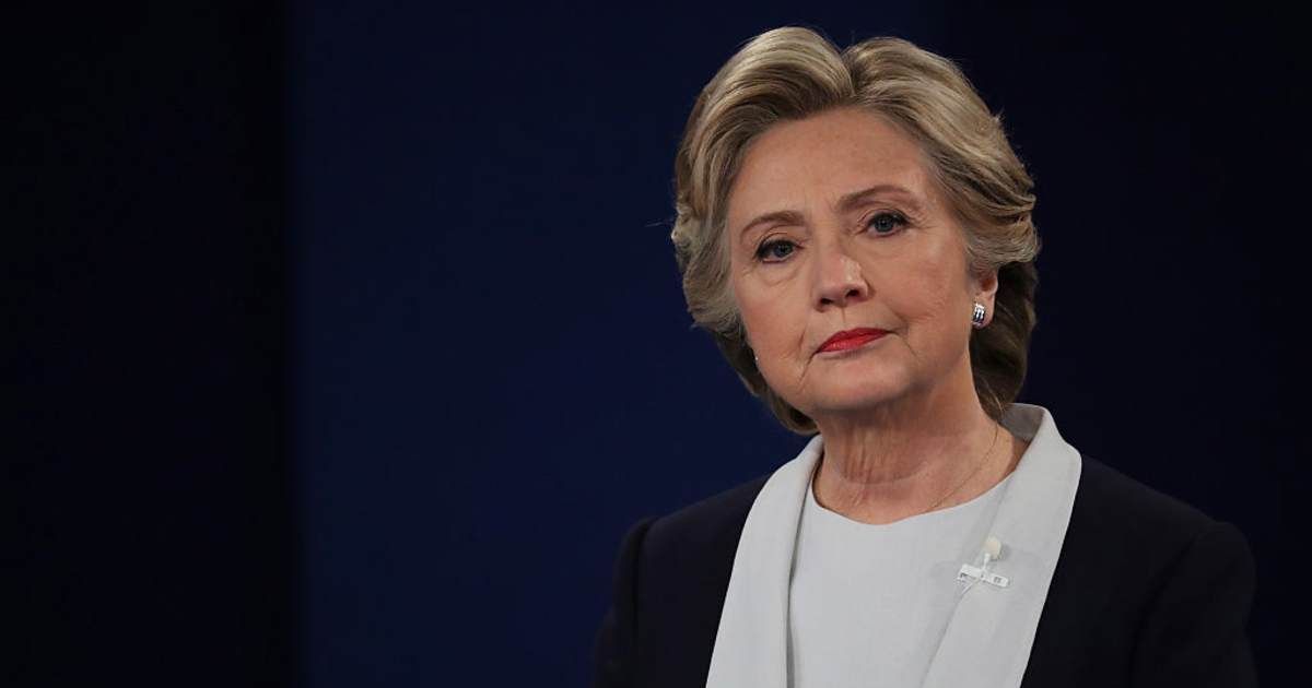Hillary Clinton listens to a question during the town hall debate at Washington University on October 9, 2016 (Cover Image Source: Getty Images | Photo by Chip Somodevilla)