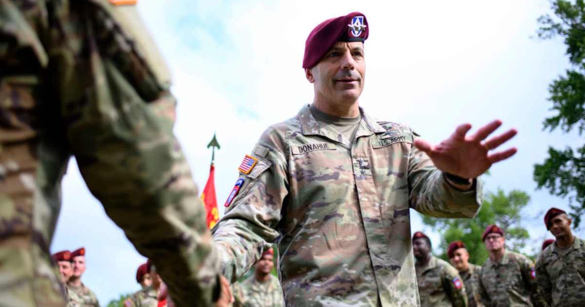 Lt. Gen. Christopher Donahue greets soldiers before a redesignation ceremony on June 2, 2023, in Fayetteville, North Carolina (Cover Image Source: Getty Images | Photo by Melissa Sue Gerrits)