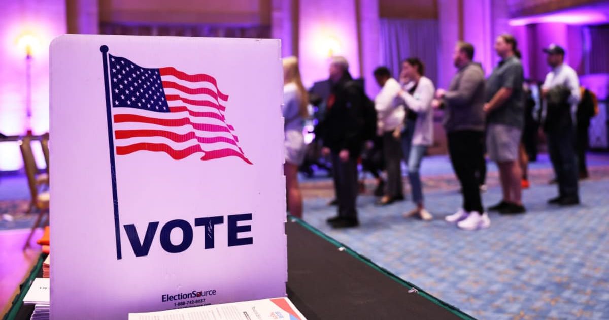 A representative image of people waiting in line to cast their ballot during the Midterm Elections at Fox Theatre on November 08, 2022 (Cover Image Source: Getty Images | Photo by Michael M. Santiago)