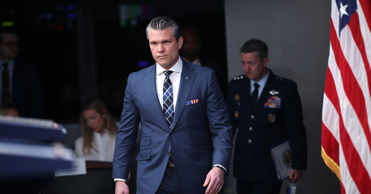 Secretary of War Pete Hegseth arrives to provide updates on the continued military operations in Iran during a press briefing on the Iran war on March 19 (Cover Image Source: Getty Images | Photo by Win McNamee)