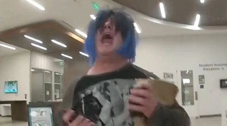 Dramatic bodycam footage shows UCF student in blue wig dragged away after screaming match