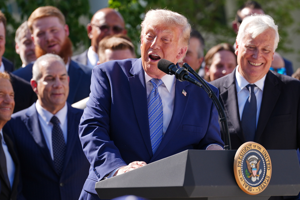 President Donald Trump speaks during an event to honor the 2025 World Series champions Los Angeles Dodgers in the Rose Garden of the White House, Thursday, July 23, 2026, in Washington, as owner Mark Walter, right, looks on. (Image source: AP Photo/Photo by Julia Demaree Nikhinson)