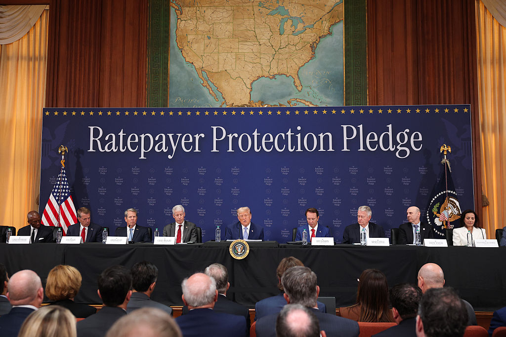 U.S. President Donald Trump (C) delivers remarks on the Ratepayer Protection Pledge alongside (L-R) CEO of the Southern Company Christopher Womack, Nebraska Gov. Jim Pillen, Georgia Gov. Brian Kemp, U.S. Energy Secretary Chris Wright, Louisiana Gov. Jeff Landry, Idaho Gov. Brad Little, Chair and CEO of Entergy Drew Marsh and former U.S. Deputy National Security Advisor Dina Powell McCormick during a roundtable at the Environmental Protection Agency headquarters (Image source: Getty Images/Photo by Kevin Dietsch)