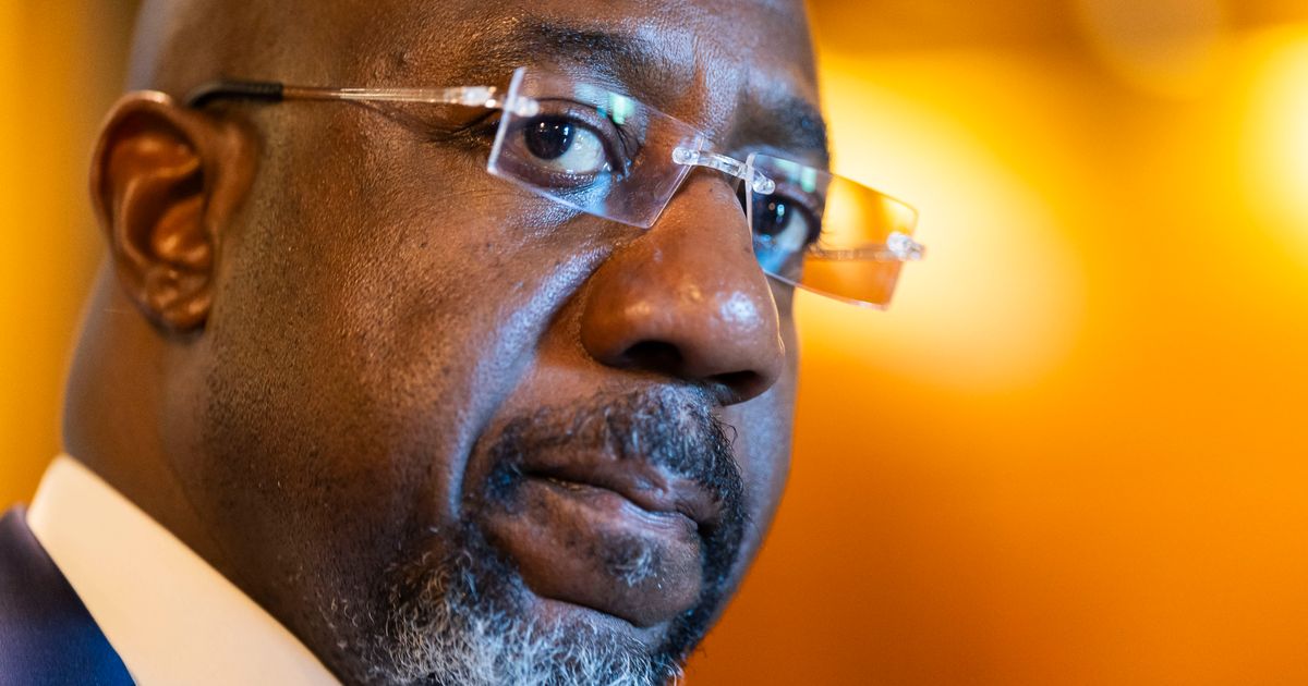 Sen. Raphael Warnock departs from the Senate Chambers during a vote in the U.S. Capitol Building on July 13, 2026 in Washington, DC. (Cover Image Source: Getty Images | Photo by Finn Gomez)