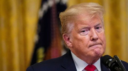 Trump attends White House Correspondents Dinner as critical reporting takes top honors